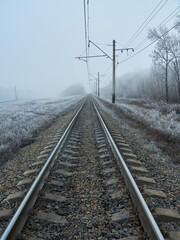 Fototapeta na wymiar Empty electric mainline railroad