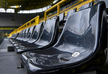 Rows of plastic seats at the stadium 