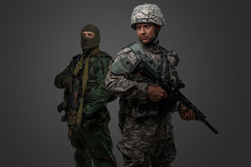 Photo of isolated on gray background nato and russia troop soldiers dressed in uniform.