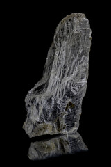 Clear white gypsum crystal on black background