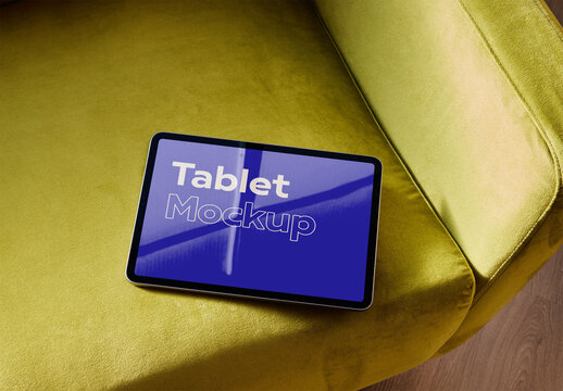 Horizontal Tablet Mockup on Green Sofa at Home