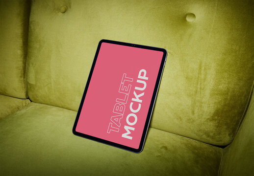 Vertical Tablet Mockup With Flash Light on Green Sofa