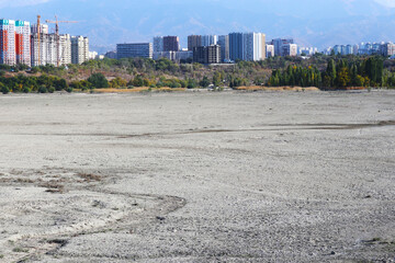 drainage of the lake in the city. the descent of water in the reservoir .dry lake