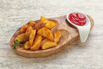 Fried rustic potato with tomato ketcup