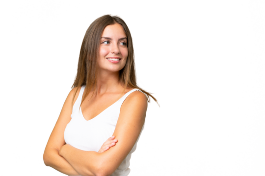 Young pretty woman over isolated background with arms crossed and happy