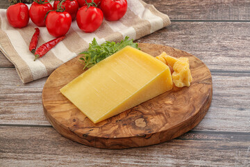 Parmesan hard cheese with small pieces