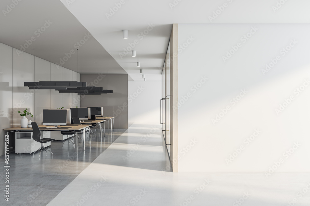 Poster front view on blank white wall with place for your advertising poster or billboard in sunlit open sp