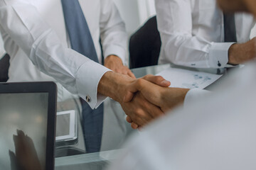 handshake of business people on a work Desk.