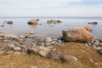 Fototapeta na wymiar Rocky seashore on the island of Kilpisaari in the Eastern Gulf of Finland National Park, Finland.