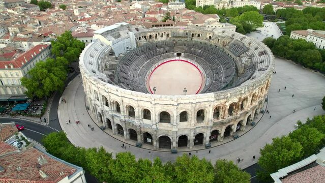 2,000 year old Roman arena, still in use in Nimes, France | 4K aerial dolly shot