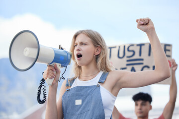 Justice, megaphone and woman protest for justice, community solidarity and human rights voice on...