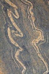 Veins on rock surface.