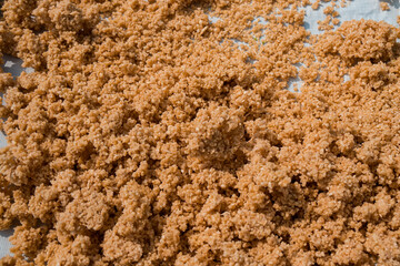 Drying gatot in the hot sun, a brown food from the Gunung Kidul region that comes from cassava tubers