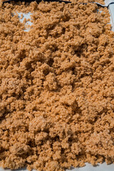 Drying gatot in the hot sun, a brown food from the Gunung Kidul region that comes from cassava tubers