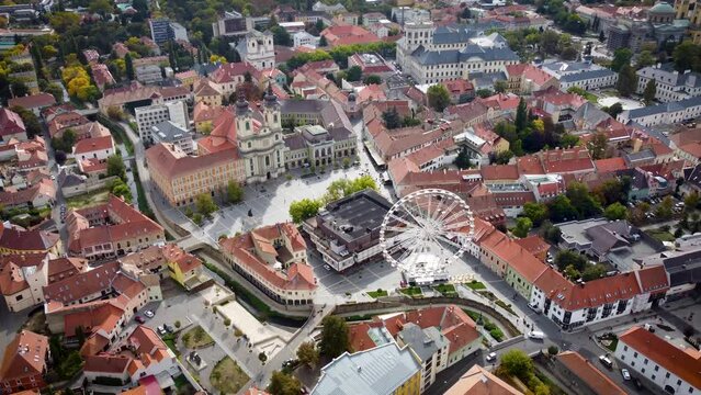 Eger Town with entreatment observation wheel and church building in the main plaza of the town