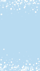 Beautiful snowfall christmas background. Subtle flying snow flakes and stars on light blue winter backdrop. Beautiful snowfall overlay template. Vertical vector illustration.