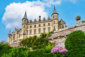 Fototapeta na wymiar Postcard landscape Dunrobin Castle & Gardens is a castle on the east coast of Scotland. It is the ancestral seat of the Clan Sutherland. United Kingdom 
