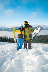 couple snowboarder ans skier portrait