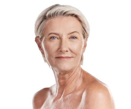 Portrait of a beautiful mature caucasian woman posing topless against pink background copyspace . Happy senior woman with glowing skin. Good skincare and a healthy routine is self care for your skin
