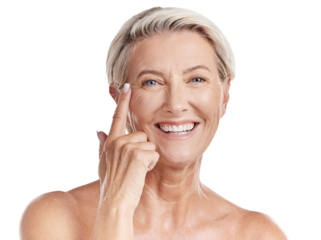 Portrait of a happy smiling mature caucasian woman looking positive and cheerful while posing topless in a studio against purple copyspace background. Older woman doing her skincare routine