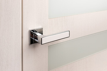 Close up of beautiful and stylish new metal door knob on modern interior door.