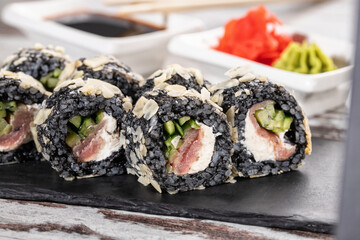 Close up of original unconventional sushi with black rice