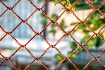 Fototapeta premium Old rusty metal wire fence