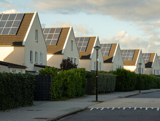 Modern houses in a row with solar panels on the roof in largest photovoltaic neighbourhood of The...