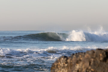 waves crashing on rocks