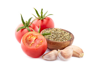 Fresh tomatoes  with spice powder  and garlic isolated on white background. Ripe tomatoes with  spices.