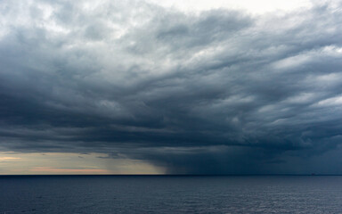 Naklejka na ściany i meble Dramatic sky and clouds during a storm over Mediterranean Sea, Valencia, Spain, Europe
