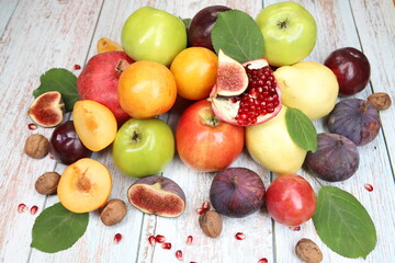 Fresh fruits on wooden background