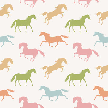 Seamless vector pattern with colorful running horses. Pastel colored horses on a beige background. Graphic print for children