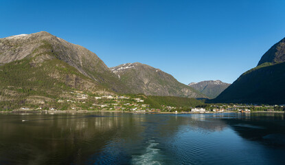 Eidfjord with mountains on a sunny day, Norway