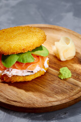 sushi menu with burger made from rice and smoked salmon, avocado, light cheese and nori