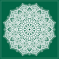 White mandala and green background.