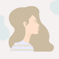 fair girl with blond hair in a blue sweater