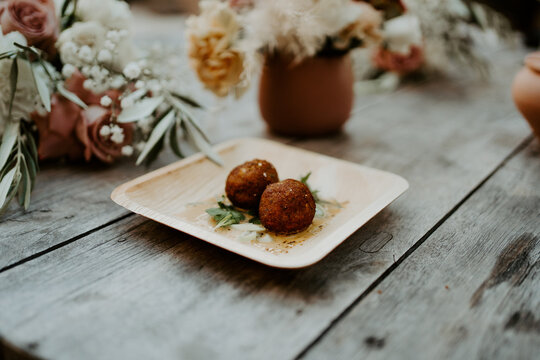 balls Petits fours and appetizer at Wedding cocktail with florals