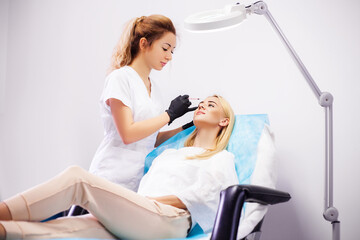 Doctor make beautiful hyaluronic lip injection for sexy girl lips