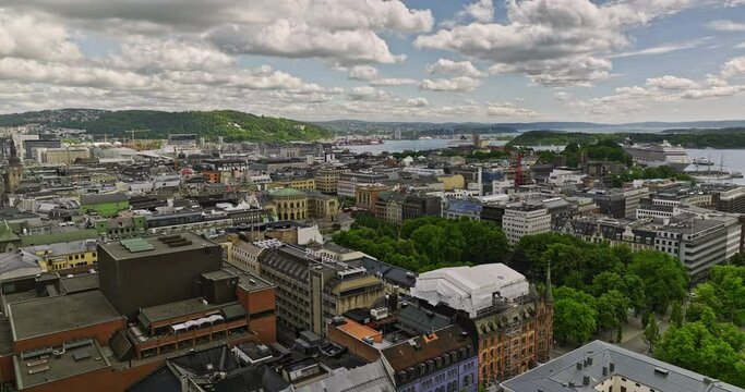 Oslo Norway v9 drone flyover downtown sentrum central area towards bekkelaget neighborhood capturing historic old town cityscape with european architectures - Shot with Mavic 3 Cine - June 2022