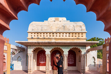 A young Indian couple shooting their pre wedding at a heritage fort in Delhi India. Romantic couple having shoot Delhi. Best young couple India. Pre wedding Indian couple.