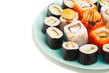 Sushi rolls japanese food on a plate isolated on white background.