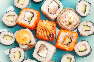 Sushi rolls japanese food on a plate top view