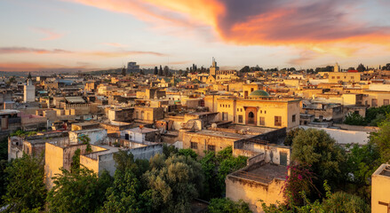 Panoramic view of the city Fes illuminated at the golden hour in Morocco