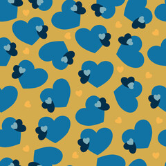 Yellow and blue seamless pattern background.  With various sized hearts. Perfect for fabric, scrapbooking, quilting, wallpaper and many more projects.
