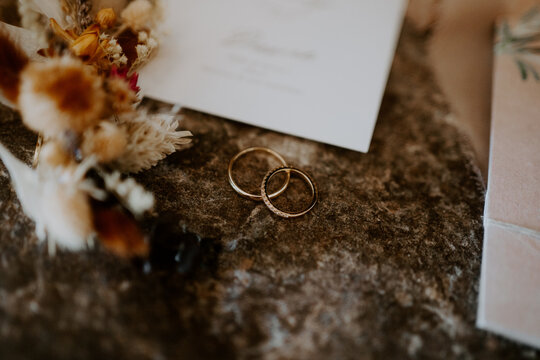 wedding ring on rocks