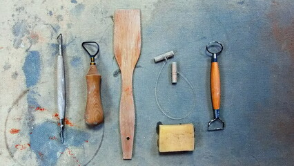Basic Pottery Tool Set on a Grunge Background. Top View. High Quality Photo