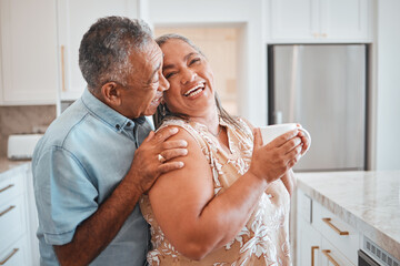 Love, laughing and elderly couple embrace in kitchen, having fun, talking and being silly together....