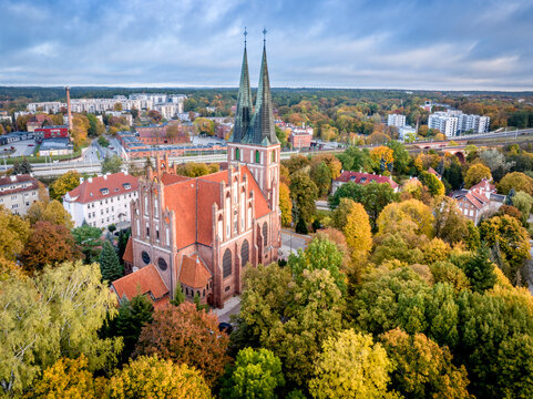 Autumn view of a church in Olsztyn at sunrise.