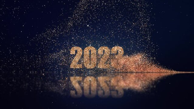 2023 new year numbers in gold particles. Change of date under the golden swirl